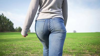 Mom-I-would-Like-to-Fuck With ample butt walking Outdoors In loose denim