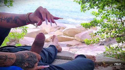 handjob surprise climax on the beach