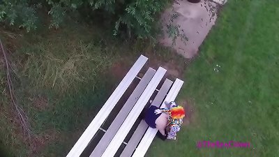 Clown drills lady in public from drone glance